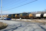 An EB grain train meets H763 in the siding at Reusens